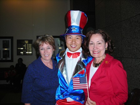 Uncle Sam and two ladies