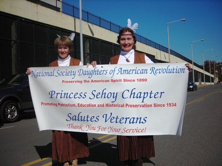 Two Indian Princesses with Banner